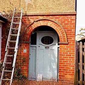 Brick archway over door
